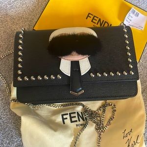 Fendi karlito leather fur trimmed leather wallet on chain crossbody bag